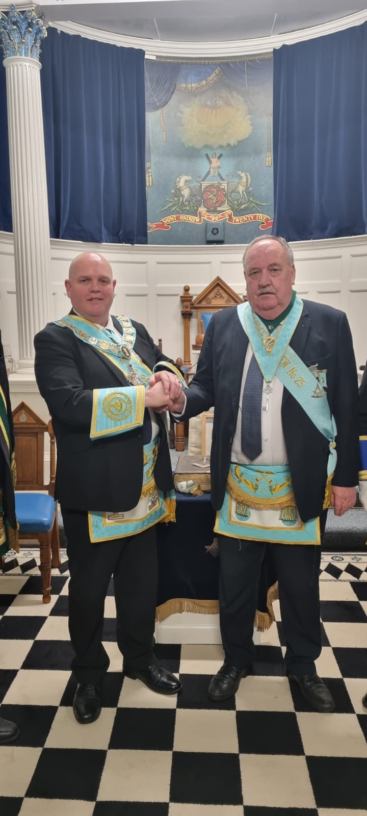brother david Y Cunningham pm receiving his 50th year diploma from the rwm brother john niven